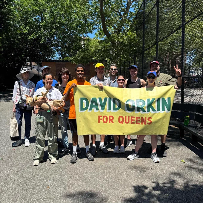 David Orkin for Queens volunteers holding his banner at the launch of a canvass for early voting in Woodhaven, Queens.