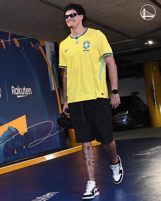 Gui Santos wears a yellow Brazil soccer jersey