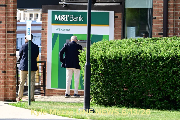 Former United States President Joe Biden is seen withdrawing money from an ATM at M&T Bank after he attended mass services at St. Joseph on the Brandywine Church in Wilmington, Delaware, Saturday, June 13, 2026.