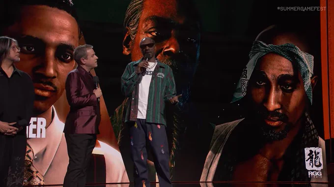 Snoop Dogg, centre, explains his role in bringing the late Tupac Shakur's likeness into the upcoming video game Stranger Than Heaven at Summer Game Fest in Los Angeles on June 4, 2026. (The Game Awards/YouTube)
