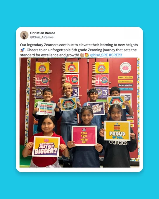 A group of seven students is standing in front of colorful classroom doors. They are holding various motivational signs from Zearn Math that celebrate math learning. The background displays educational decorations related to Houston ISD.