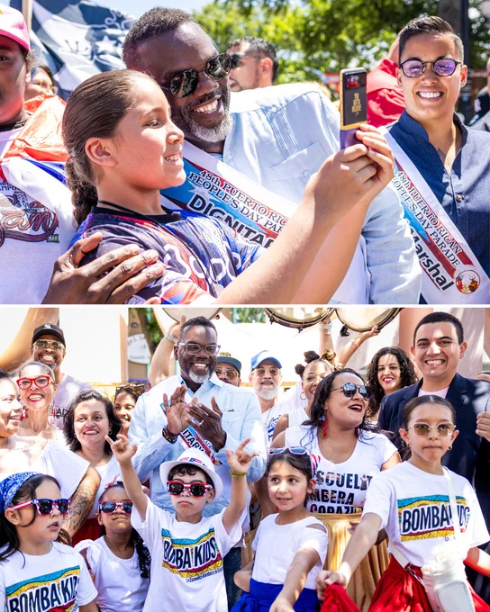 4. Top: A young Puerto Rican Chicagoan girl takes a selfie with Mayor Johnson  at the Puerto Rican People's Day Parade in Humboldt Park. Bottom: Mayor Johnson claps with the Bomba Kids at the Puerto Rican People's Day Parade in Humboldt Park.