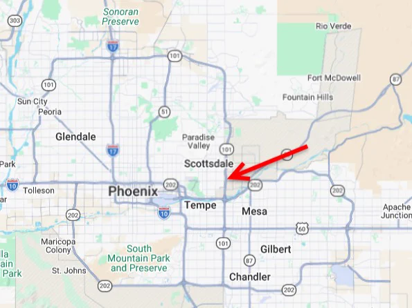 A red arrow points to a spot on northbound Arizona Loop 101. Nearby areas seen are Scottsdale and Phoenix.