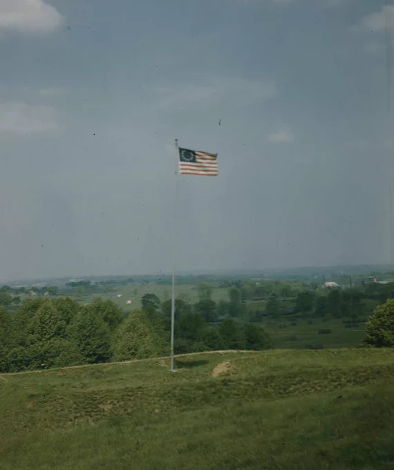 State Archives image shows a 13-star flag on display at Valley Forge National Historical Park. 