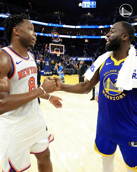 OG Anunoby shakes hands with Draymond Green