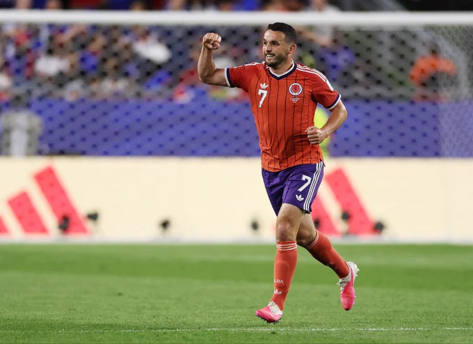 John McGinn of Scotland celebrates after scoring a goal in the FIFA World Cup 2026 match against Haiti.