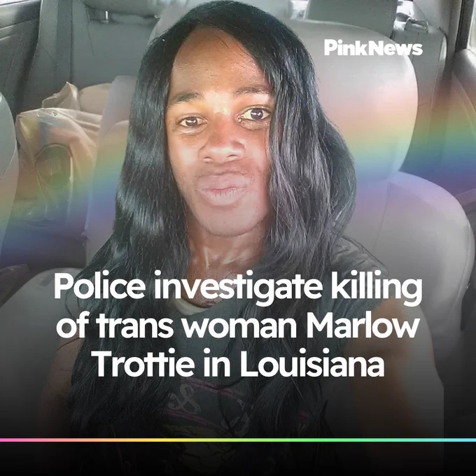 A person with long black hair is sitting inside a car. The image contains text stating, "Police investigate killing of trans woman Marlow Trottie in Louisiana." There is a rainbow overlay and the logo of PinkNews in the top right corner.