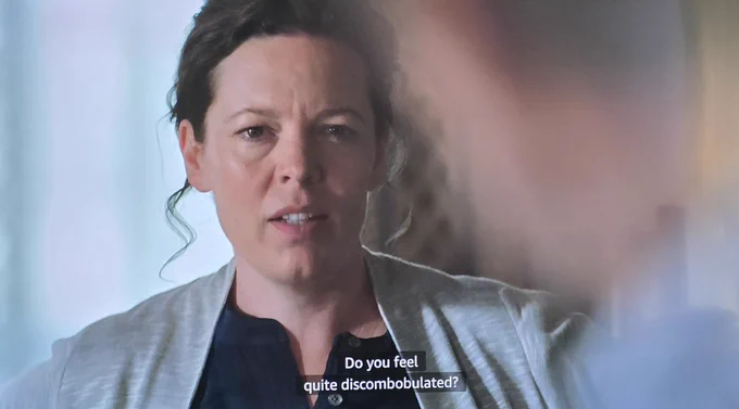 Photo of a scene from Night Manager Season 1 showing Olivia Coleman with the subtitle "Do you feel quite discombobulated?"