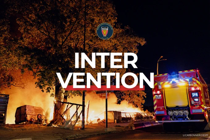 Sapeurs-pompiers de Paris intervenant sur un feu d'installations précaires à Saint-Denis (93)