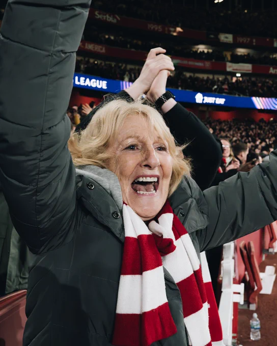 Image of Arsenal supporter cheering 