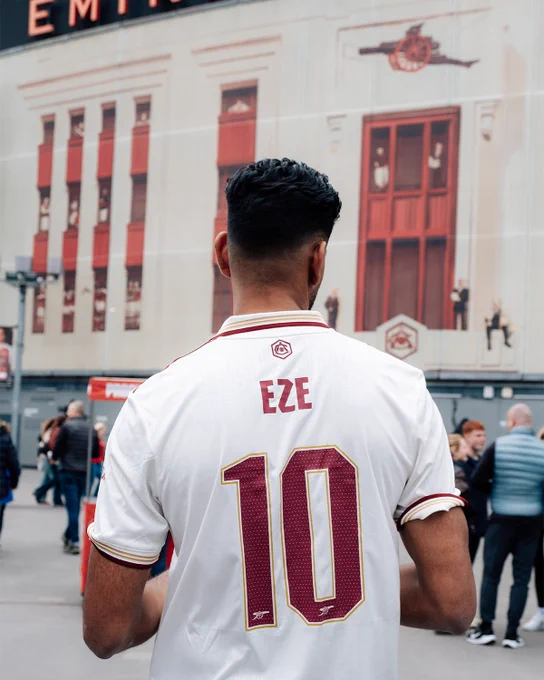 Image of an Arsenal supporter in an Eze kit outside the stadium