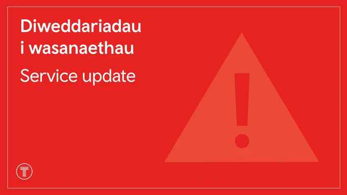 A notice from Transport for Wales about a service update.

The text says "Diweddariadau i wasanaethau
Service update".

The red graphic also shows an icon of a warning sign.