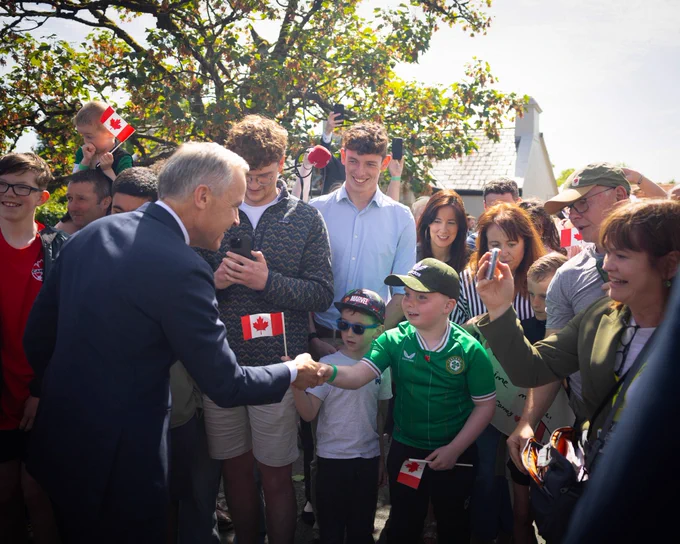 Prime Minister Carney meets and shakes hands with members of the community in County Mayo, Ireland.
