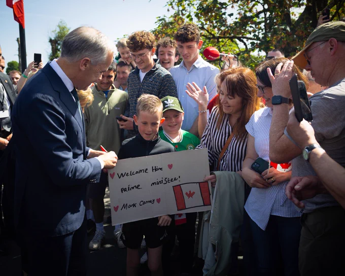 Prime Minister Carney meets and shakes hands with members of the community in County Mayo, Ireland.
