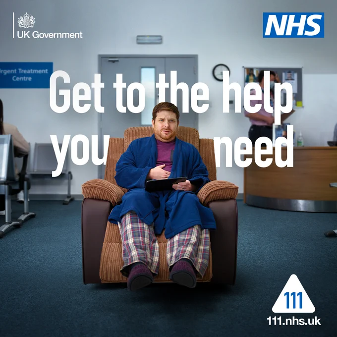 A man sat on an armchair looking unwell. His hand is placed on his tummy while holding an electronic tablet in the other hand. The armchair is placed in the middle of an urgent treatment centre waiting room.

The headline text reads: "Get to the help you need"

The 111 logo features in the bottom right of the image. The NHS logo features in the top right of the image.