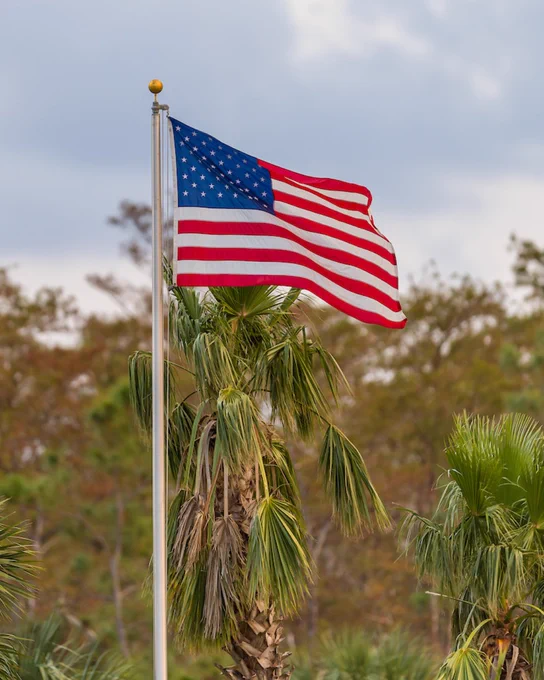 a photo of the american flag outdoors