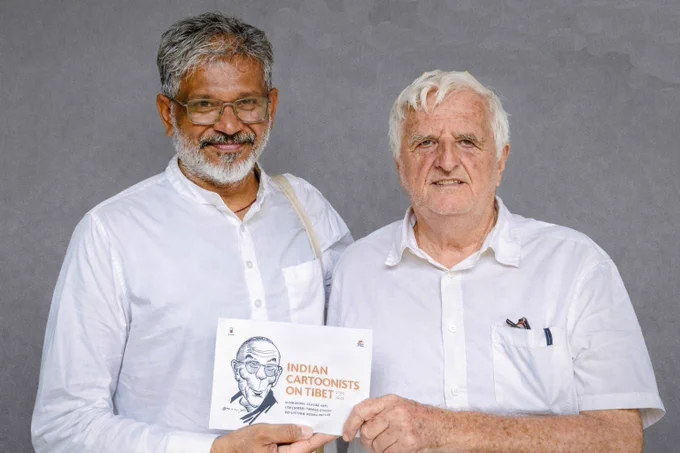 Claude Apri, the French-born author and Tibetologist who narrated cartoons for 'Indian Cartoonists on Tibet (1950-2025)', receives a copy of the book from Sethu Das, founder of Friends of Tibet. // Buy a copy online: https://tinyurl.com/FOTBOOK2026