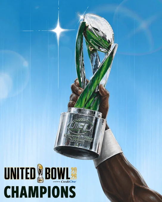 A triumphant scene featuring a hand holding up the United Bowl Champions trophy against a clear blue sky, symbolizing victory and celebration.