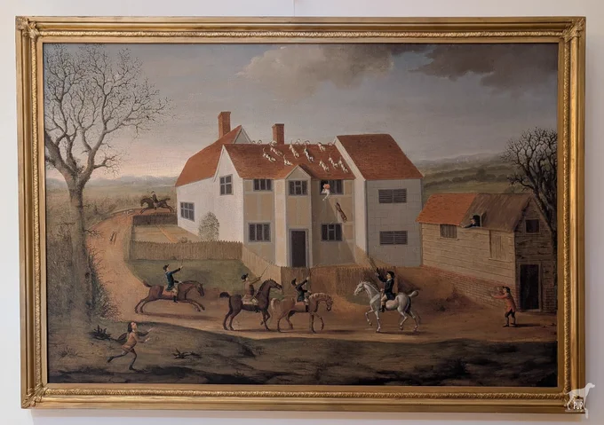 Painting of foxhounds bounding over the top of a house in the mid 1700s.