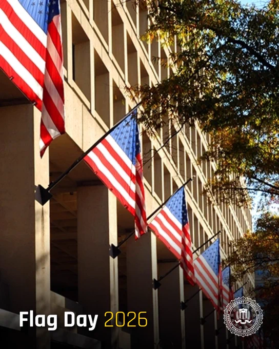 American flags hanging from J. Edgar Hoover building in Washington D.C.