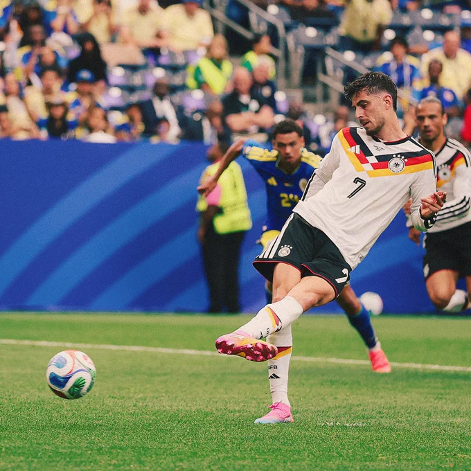 Kai Havertz scores the first of two goals against Curacao from the penalty spot.