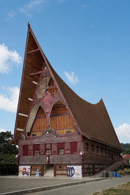 📍 Gereja Katolik Paroki Santo Mikhael Pangururan (St. Michael Parish Catholic Church)

Located on Samosir Island in Lake Toba, North Sumatra, the church is renowned for its unique inculturative architecture that blends Catholic faith with traditional Batak Toba design.