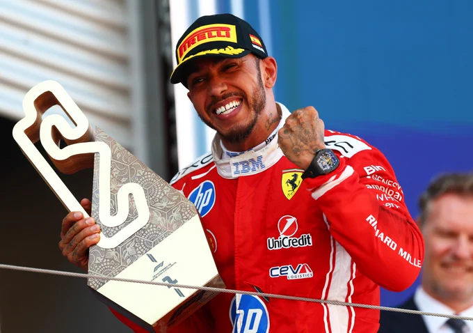 Lewis Hamilton celebrates his win at Barcelona-Catalunya, his first win with Ferrari.