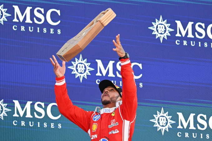 Lewis Hamilton celebrates his win at Barcelona-Catalunya, his first win with Ferrari.