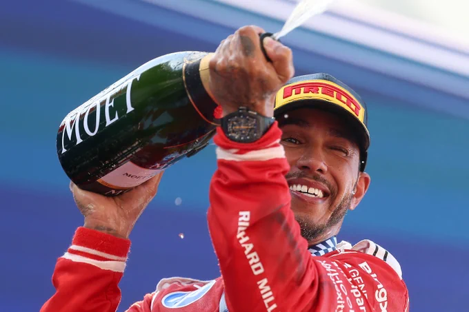 Lewis Hamilton celebrates his win at Barcelona-Catalunya, his first win with Ferrari.