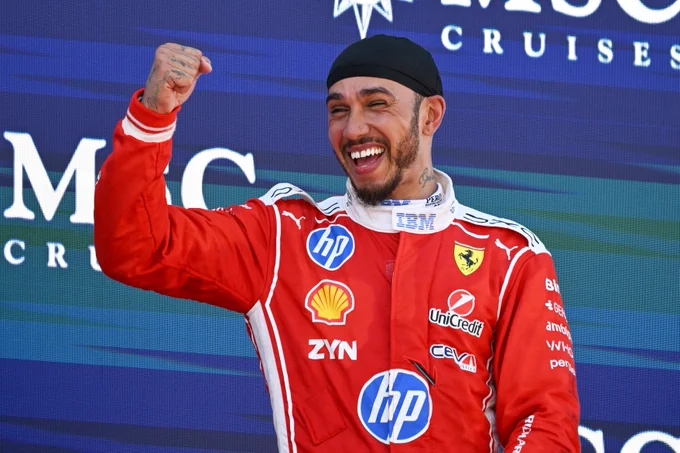 Lewis Hamilton celebrates his win at Barcelona-Catalunya, his first win with Ferrari.