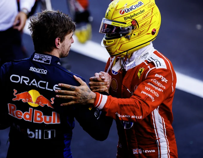 Max and Lewis shake hands in parc ferme