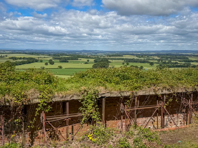 The view out across Shropshire with the redundant Wrekin rifle range in the foreground.