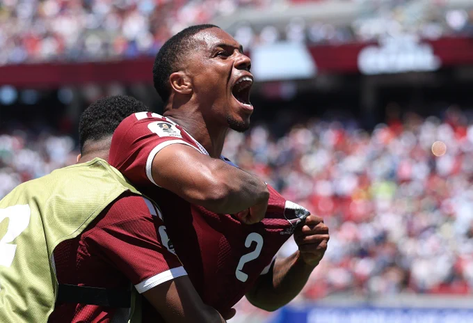 Qatar players celebrate a last-minute equaliser in their FIFA World Cup 2026 match against Switzerland. 