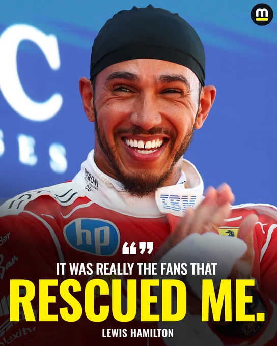 Lewis Hamilton smiling after winning the Barcelona-Catalunya Grand Prix. He was speaking in the media pen and said "it was really the fans that rescued me."