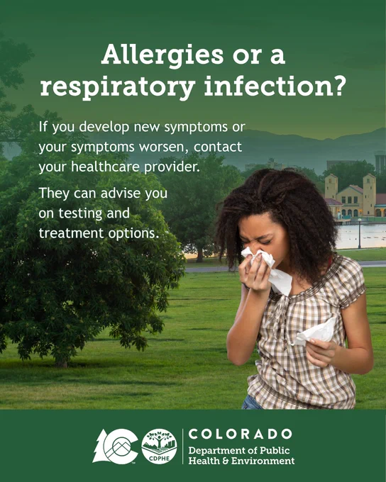 The background is a park with a green overlay, and a woman blowing her nose is in the forefront.