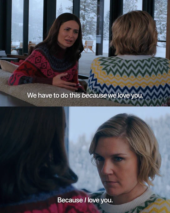 From Pluribus. Karolina Wydra as Zosia and Rhea Sheehorn as Carol are seen in two frames together in a snowy setting. In the first Zosia’s face is visible as she speaks to Carol. The text, “We have to do this because we love you” is written in white. In the bottom image Carol’s face is visible as she looks at Zosia. The text, "Because I love you" is written in white.