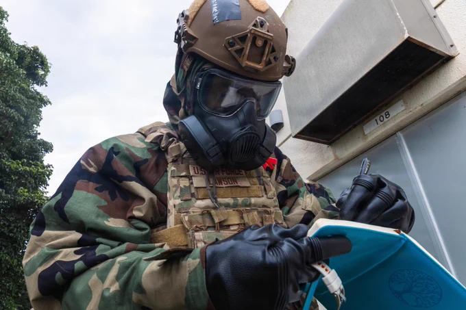 U.S. Air Force Airman 1st Class Kameron Lawson, an Emergency Management specialist with the 775th Civil Engineer Squadron, 75th Air Base Wing, records time stamps during a simulated biological response scenario as part of exercise Toxic Wave 26 at Marine Corps Air Station Futenma, Okinawa, Japan, May 30, 2026. Toxic Wave 26 is a joint chemical, biological, radiological and nuclear defense exercise hosted by Marine Wing Support Squadron 172 in partnership with Pacific Air Forces and multiple Air National Guard units. Conducted across Okinawa, the exercise enhances interoperability and strengthens readiness to respond to evolving threats throughout the Indo-Pacific region. (U.S. Marine Corps photo by Cpl. Jeremiah Barksdale)\n\n