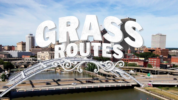 GRASS
ROUTES

on top of a picture of a bridge in Rochester, New York