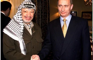 KGB agent Vladimir Putin with Yasser Arafat