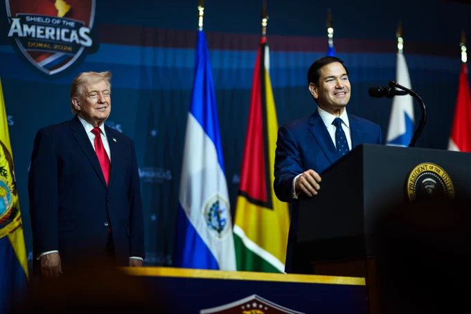 First picture of President Trump, Secretary Rubio, and Secretary Burgum sitting at a table, looking in the same direction. Second picture is of Secretary Rubio standing at a podium, smiling, while President Trump stands behind smiling as well. 
