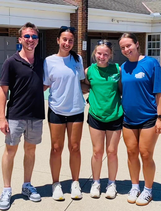 Jacob Ames and three female staff members pose at the Parma Heights Community Pool opening