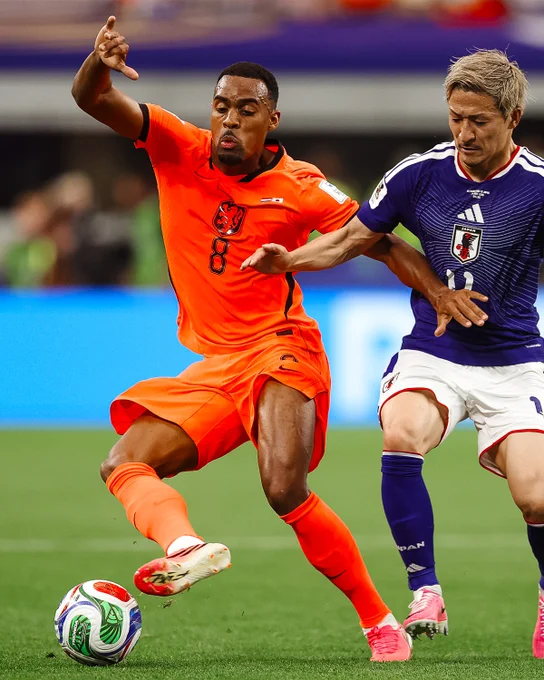 Photography of Ryan Gravenberch in action for Netherlands against Japan at the 2026 World Cup. The match finished 2-2.