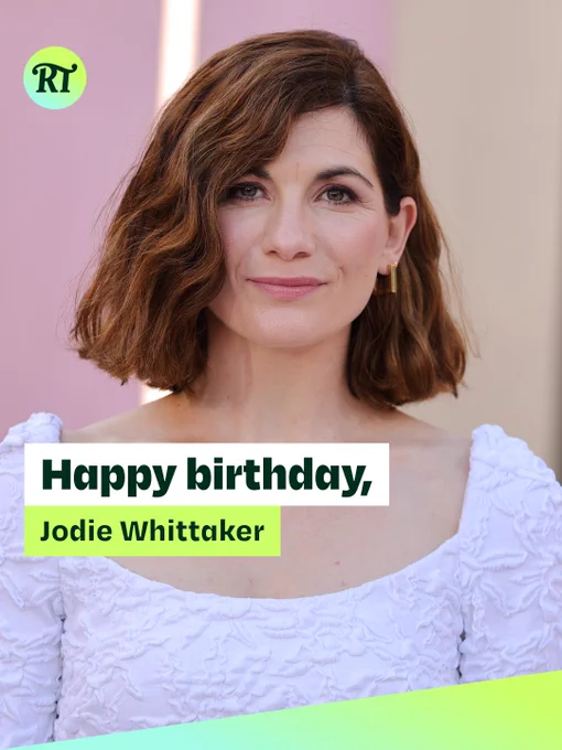 Promotional graphic featuring actor Jodie Whittaker smiling at the camera. She wears a white textured dress and gold earrings against a softly blurred pink and cream background. An RT logo appears in the top-left corner. Overlaid text reads: “Happy birthday, Jodie Whittaker.” A green gradient banner runs diagonally across the bottom of the image.