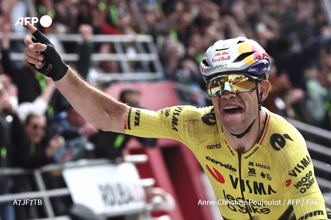 Wout van Aert celebrates after winning the Paris-Roubaix race in northern France, on April 12, 2026.