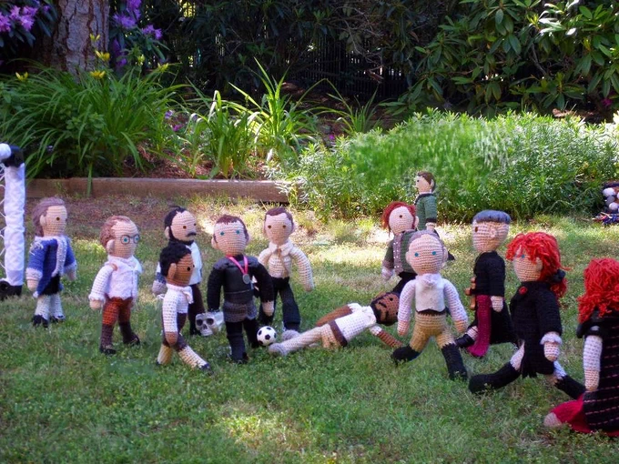 Crochet dolls l-r: Robert Townsend, Nathaniel Sackett, Cicero, Caleb Brewster, Karl Tanner, Marshal Kahler, Akinbode, William Guppy, Benjamin Tallmadge, Don Bruciare Gormangia, John Graves Simcoe & Demelza Poldark. Nicholas Farlow & Garden in background. 
